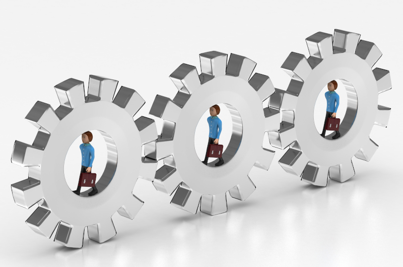 Three silver gears with small human figures inside, each holding a briefcase, symbolizing people as workers within a mechanical system.